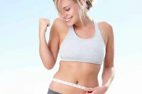 woman happy after fat reduction treatment Poole