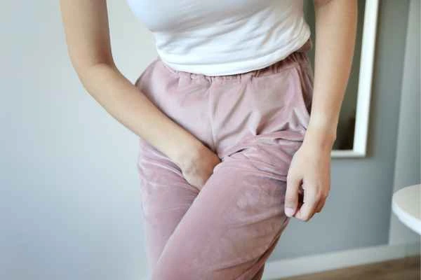woman struggling with urine incontinence Poole