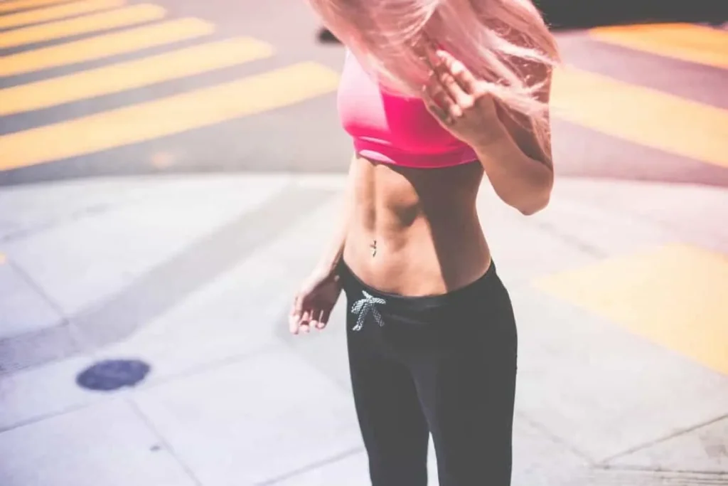 Woman with toned stomach after LA-EMS Body Sculpting Treatment Poole
